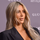Image for article titled Kim Kardashian Wears Socks, You May Now Leave the House